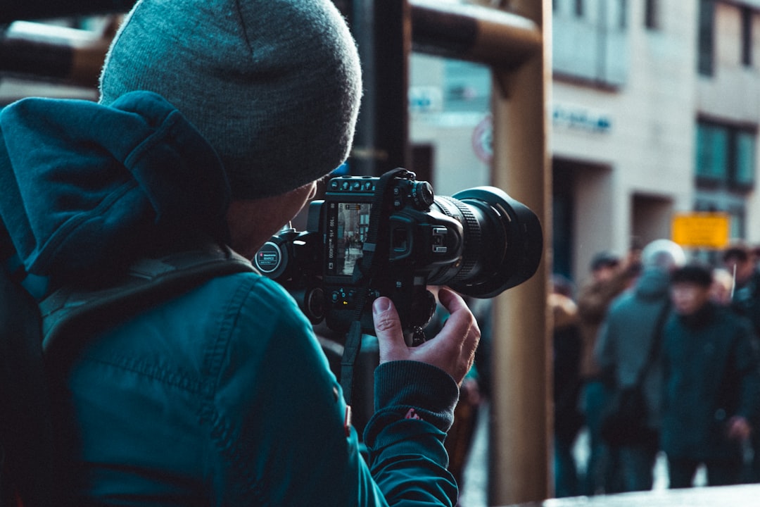 Professional photographer with camera